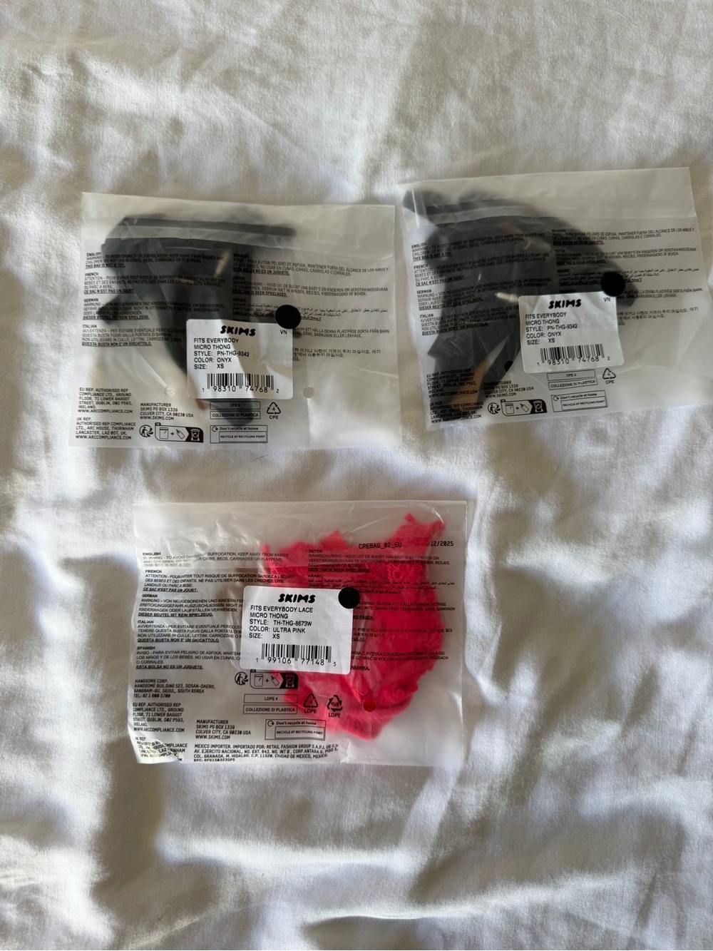 3 SKIMS Micro Throng Hot Pink and Onyx